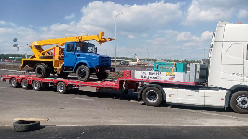 перевозка грузовика на трале компании АвтоСтройСервис